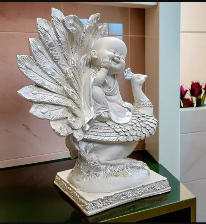 Smiling Baby Buddha with Peacock – Spiritual Resin Decorative Idol