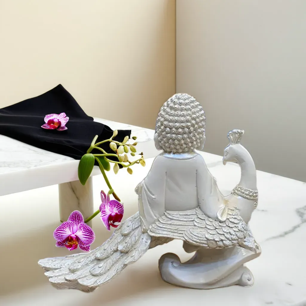 Meditating Baby Buddha with Peacock – Spiritual Resin Decorative Idol