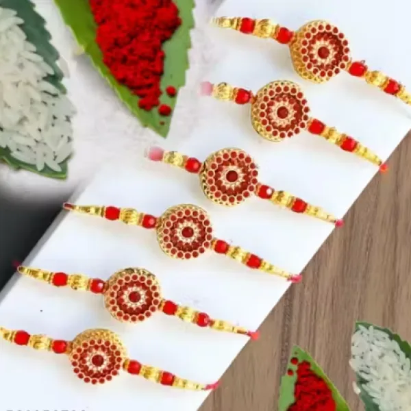 LIGHT FANCY RED GOLD RAKHI 6 PICE COMBO